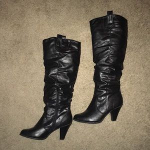 Knee high black faux leather boots